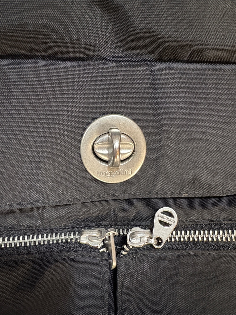 Baggallini Black Compact Crossbody Sling Backpack - Picture 2 of 5